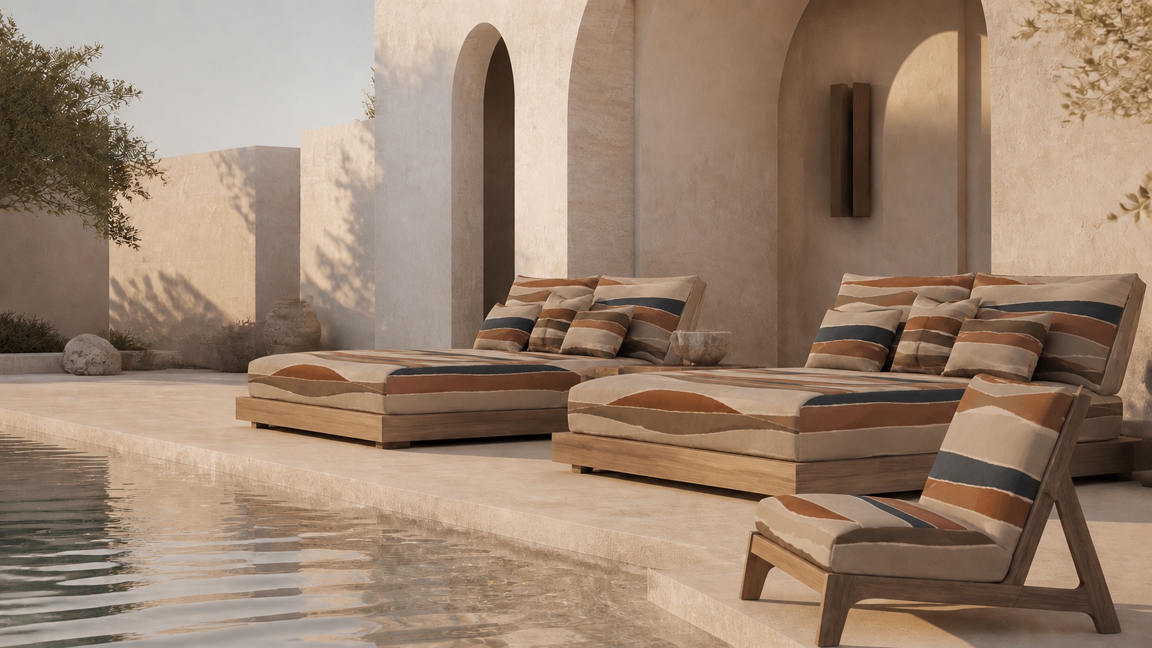 Resort daybeds upholstered in the STRATA design in a stone courtyard.